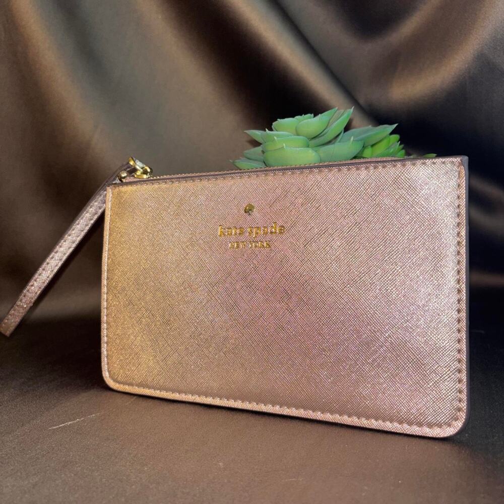 Kate spade wristlet metallic rose excellent condition